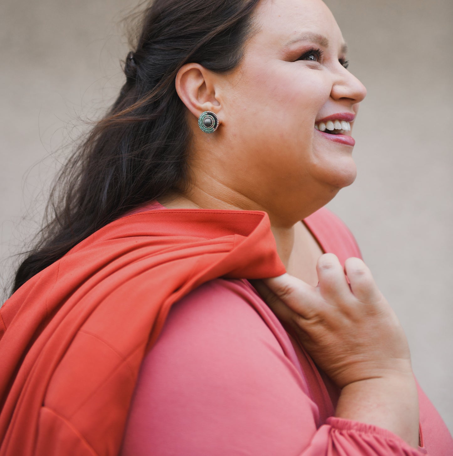 Jana Schmieding Wearing Cheyanne Symone's Little Green Beaded Earrings | Green and Black Seed Beads with Gold Plated Seed Bead Accents Wrapped Around a Green Glass Bead Center