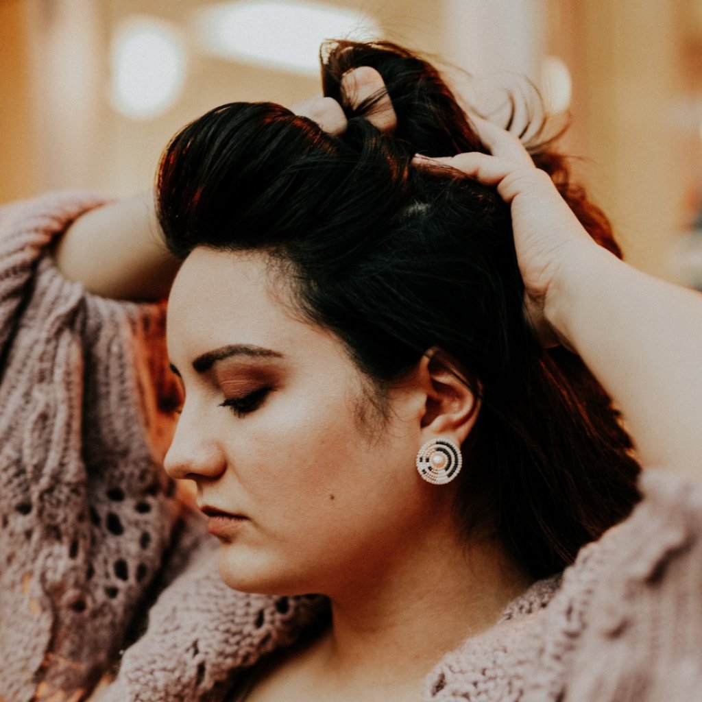 Model Wearing Cheyanne Symone’s Circle Direction Freshwater Pearl Earrings | Glass Seed Beads in a Beautiful Pattern Wrapped Around a Freshwater Pearl Center