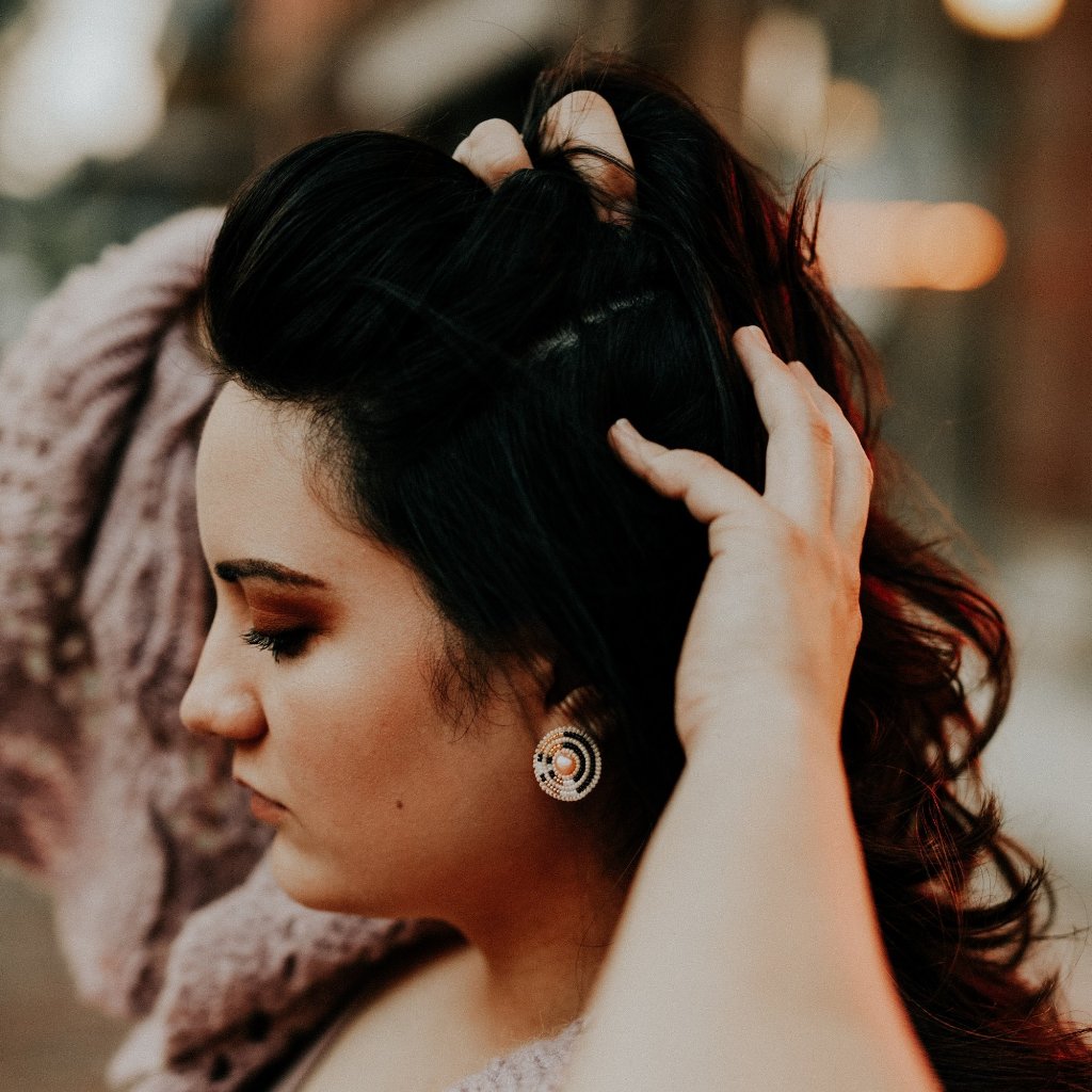 Model Wearing Cheyanne Symone’s Circle Direction Freshwater Pearl Earrings | Glass Seed Beads in a Beautiful Pattern Wrapped Around a Freshwater Pearl Center