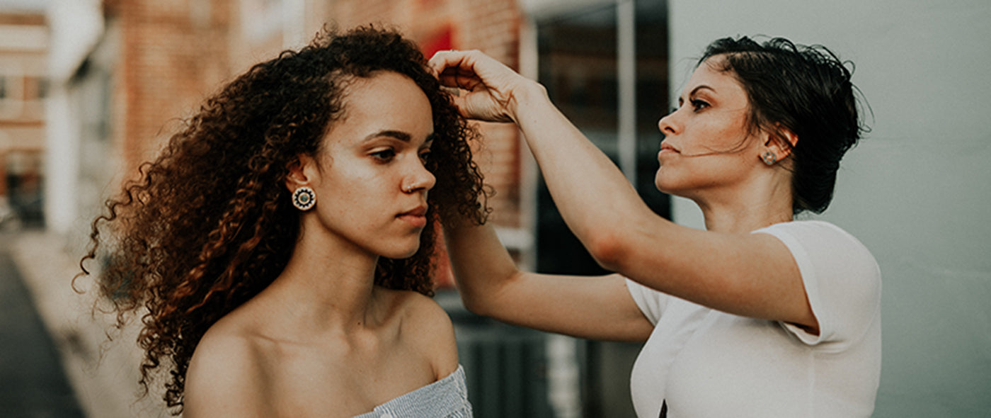 Cheyanne Symone's Founder Brittany Turner Prepping a Model Wearing the Adeline Earrings for a Photoshoot