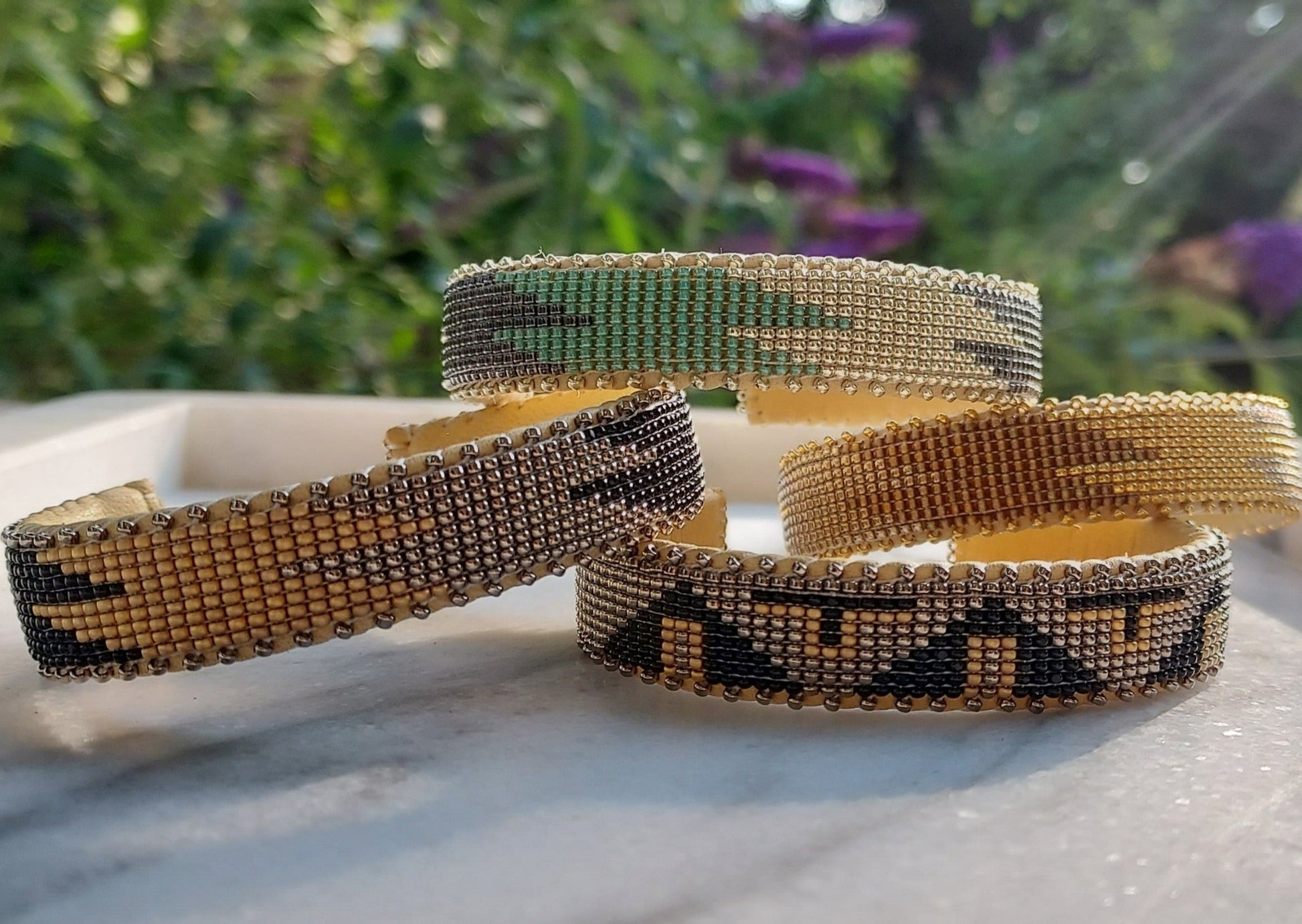 Etkie Bracelet - Canyon Glass Cuff Small Pictured with Several Other Etkie Beaded Bracelets