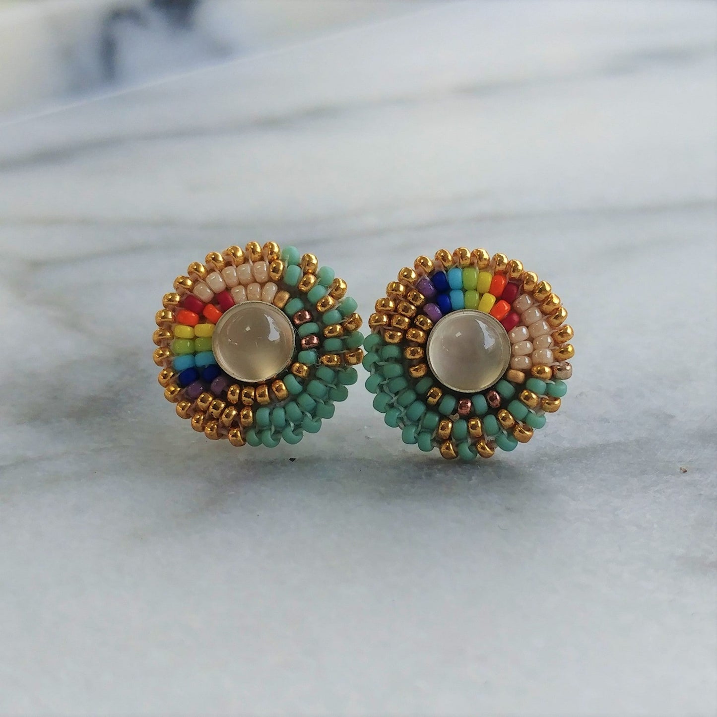 Cheyanne Symone’s Moonstone Two-Spirit Pride Stud Earrings | Rainbow Glass Beads Wrapped Around a Moonstone Center