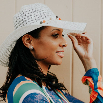 Model Wearing Cheyanne Symone Periwinkle Beaded Earrings- Periwinkle and Gold Glass Seed Beads Surrounding a Freshwater Pearl Center