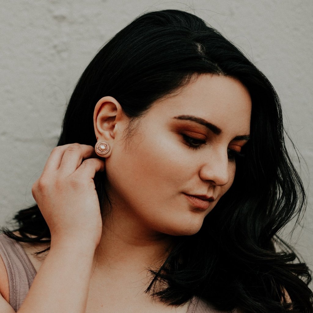 Model Wearing Cheyanne Symone’s Salmon Freshwater Pearl Stud Earrings